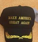 12 black TRUMP Gold caps scrambled